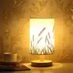 Modern linen table lamp with USB port and touch control on bedside table