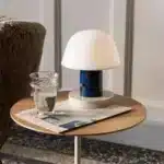 Nordic retro mushroom table lamp with warm LED glow on a bedside table