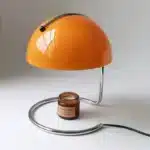 Modern table lamp with mushroom shade in a cozy bedroom