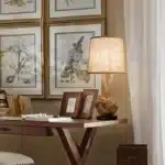 Vintage table lamp with hemp rope and iron base, emitting warm light on a bedside table