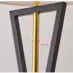 Modern floor lamp with iron frame and fabric shade in a contemporary living room