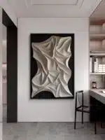 Modern abstract LED wall art glowing in a stylish living room