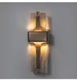 Rustic wall sconce with Edison bulb illuminating a modern loft bedroom