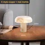 Elegant marble table lamp with soft glow on bedside table in bedroom