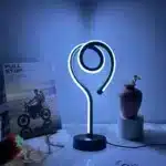 Water ripple nightlight projecting colorful waves on bedroom wall