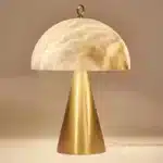 Elegant marble table lamp with soft glow on bedside table in bedroom