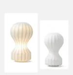 Wabi sabi floor lamp with textured fabric shade in a cozy living room corner