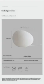 Warm night light pebble LED lamp glowing on a bedside table