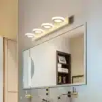 Modern LED mirror light illuminating a stylish bathroom vanity