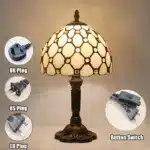 Vintage table lamp with handmade colored glass shade casting warm ambient light