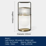 Modern table lamp with glass shade on bedside table