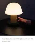 Nordic retro mushroom table lamp with warm LED glow on a bedside table