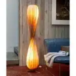 Wooden floor lamp with warm glow in a cozy living room