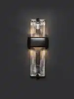 Rustic wall sconce with Edison bulb illuminating a modern loft bedroom