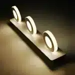 Modern LED mirror light illuminating a stylish bathroom vanity