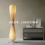 Wooden floor lamp with warm glow in a cozy living room