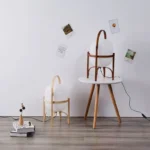Modern table lamp with wood and glass base, minimalist design for bedroom or living room