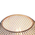 Battery table lamp with metal cage and warm LED glow on a wooden table