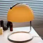 Modern table lamp with mushroom shade in a cozy bedroom
