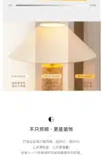 Modern marble LED table lamp with white fabric shade on wooden desk