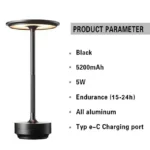 Modern USB table lamp with charging port on a wooden desk