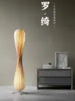 Wooden floor lamp with warm glow in a cozy living room