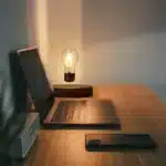 Floating LED lamp with levitating bulb on a wooden desk in a modern living room