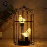 Vintage table lamp with hanging lantern and candlestick design, metal hollow lanterns for warm ambient lighting