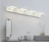 Round LED wall lamp with acrylic shade in a modern living room