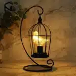 Vintage table lamp with hanging lantern and candlestick design, metal hollow lanterns for warm ambient lighting