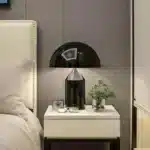 Modern mushroom table lamp with metal shade and wood base on bedside table