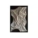 Modern abstract LED wall art glowing in a stylish living room
