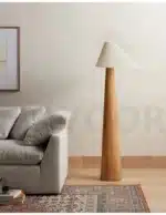 Conical oak floor lamp with wabi-sabi style in a cozy living room