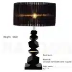 Modern crystal floor lamp with black finish and LED light in a living room