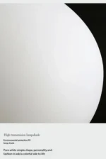 Modern table lamp with warm glow on bedside table