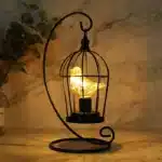 Vintage table lamp with hanging lantern and candlestick design, metal hollow lanterns for warm ambient lighting
