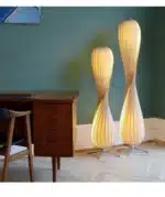 Wooden floor lamp with warm glow in a cozy living room