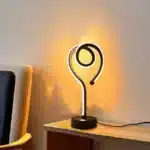 Water ripple nightlight projecting colorful waves on bedroom wall