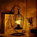 Vintage table lamp with hanging lantern and candlestick design, metal hollow lanterns for warm ambient lighting