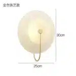 Modern wall lamp with minimalist Nordic design illuminating a cozy bedroom bedside