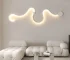 Modern wall lamp LED snake shaped decorative light in living room