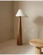 Conical oak floor lamp with wabi-sabi style in a cozy living room