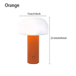 Modern mushroom table lamp with warm glow on wooden table