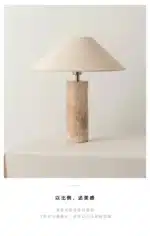 Modern marble LED table lamp with white fabric shade on wooden desk