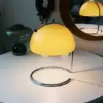 Modern table lamp with mushroom shade in a cozy bedroom