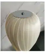 Wooden floor lamp with warm glow in a cozy living room