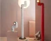 Space age floor lamp in red and white by Santa Cole, designer floor lamp for living room