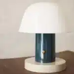 Nordic retro mushroom table lamp with warm LED glow on a bedside table