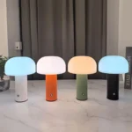 Modern mushroom table lamp with warm glow on wooden table