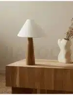 Conical oak floor lamp with wabi-sabi style in a cozy living room